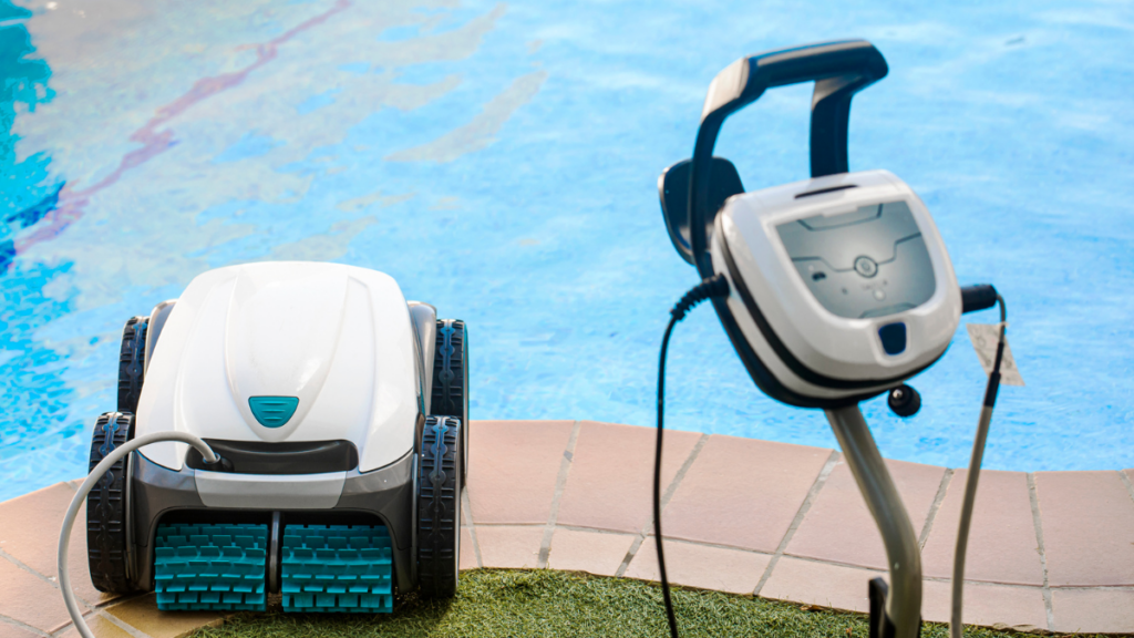 Robotic pool cleaner positioned beside a pool, ready for automated cleaning and maintenance for a pristine swimming environment.