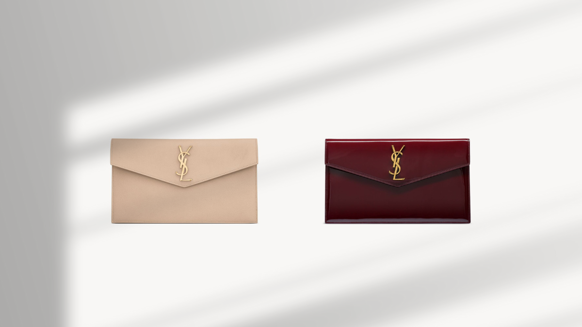 Elegant beige and burgundy designer clutch bags with gold YSL logo, showcasing a luxurious and timeless accessory design perfect for evening events.