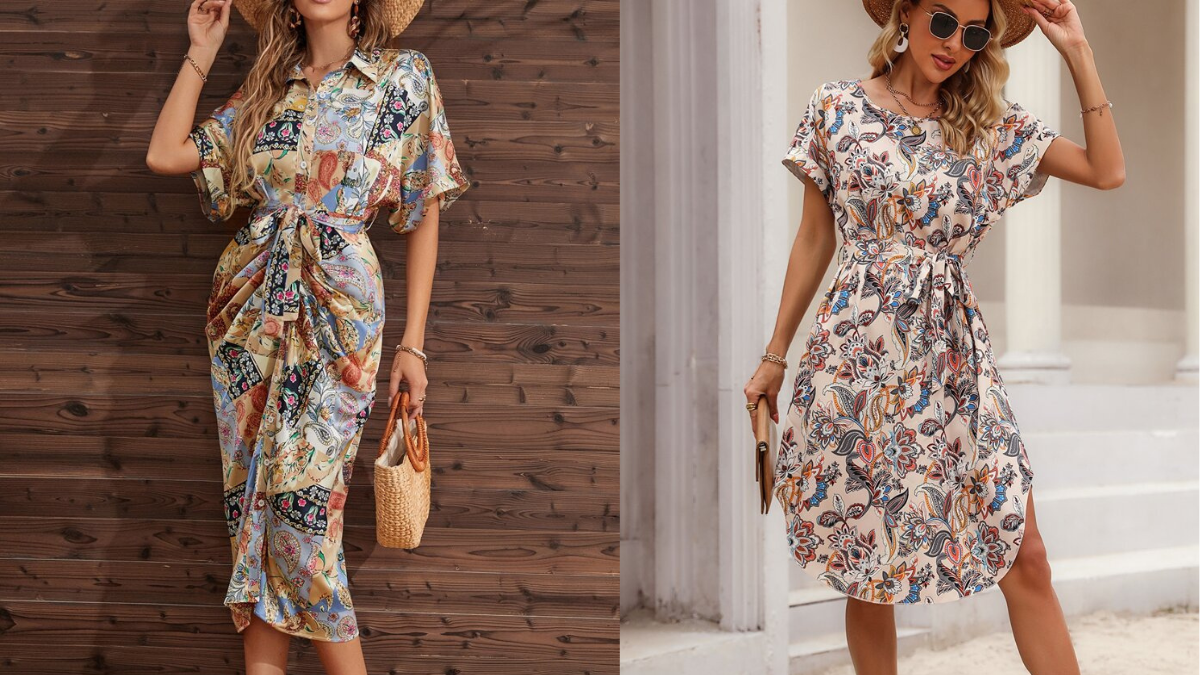 Two women wearing belted floral dresses with short sleeves. One wears a colorful patterned midi dress and holds a woven bag, while the other wears a cream dress with a floral print and sunglasses.