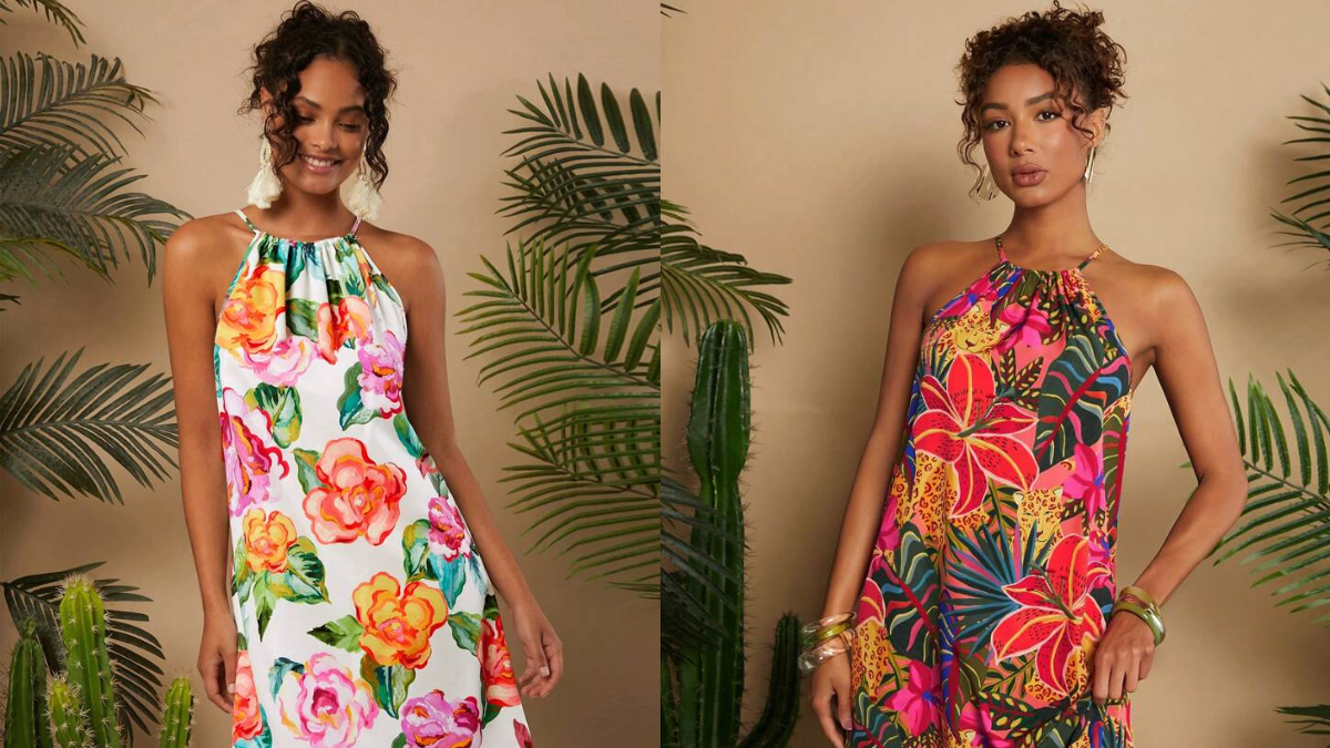 Two women wearing tropical halter dresses with vibrant floral prints, set against a neutral backdrop with green plants.