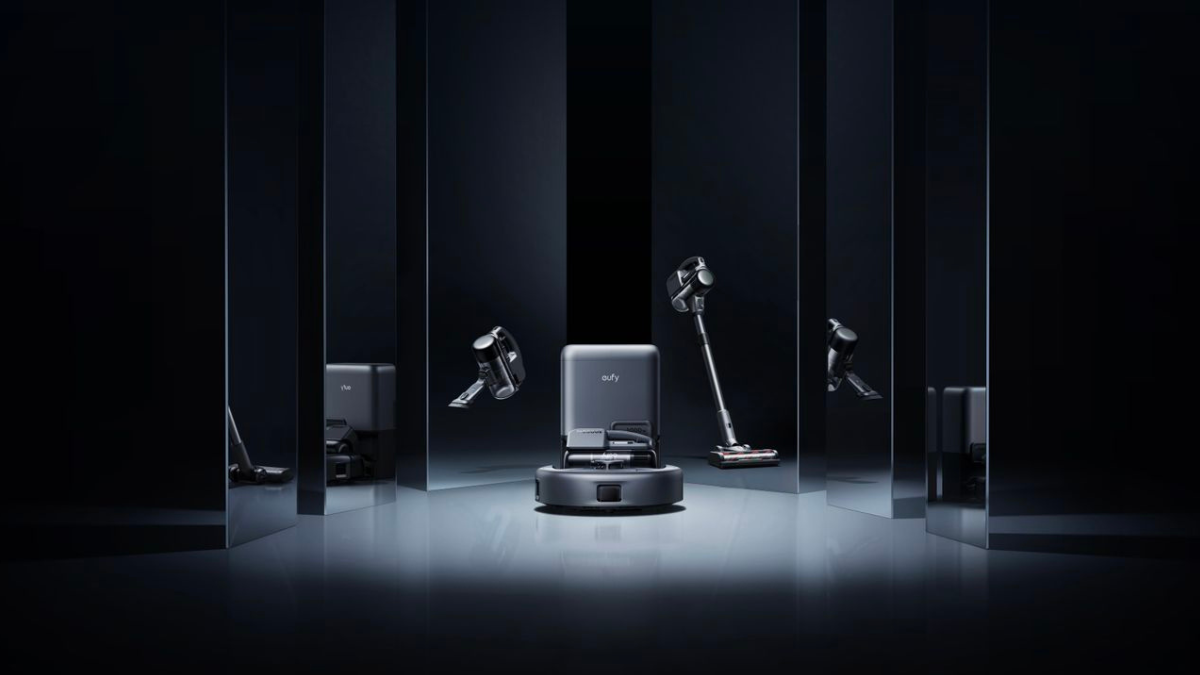 Futuristic display of a smart robot vacuum and cordless stick vacuum in a dark, reflective setting.